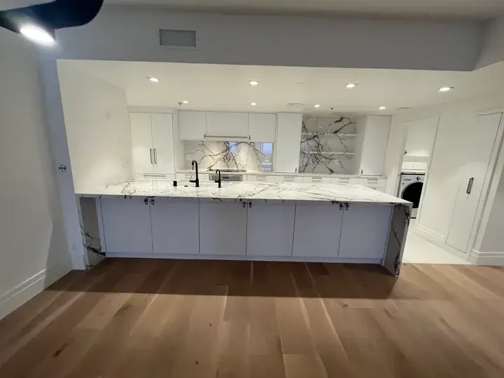 looking into white kitchen area